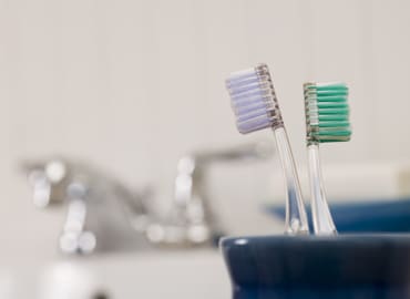 A family toothbrushing